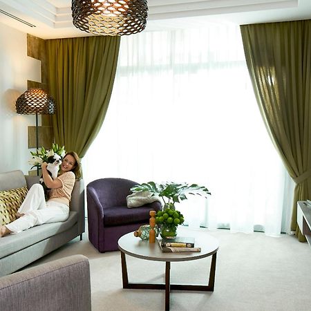 Fraser Place Robertson Walk Singapore Exterior photo A living room in a hotel suite